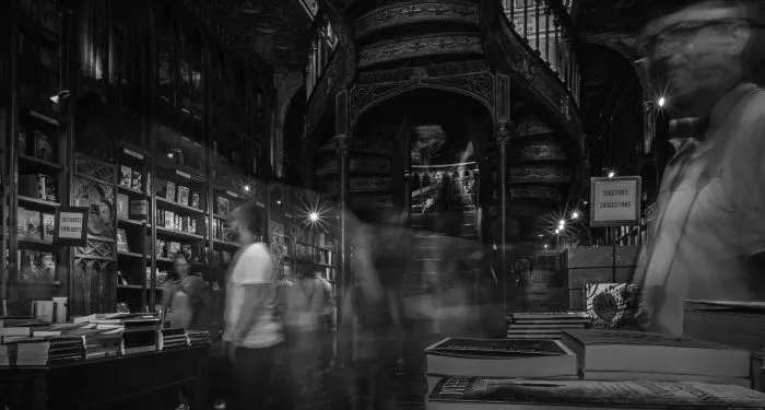 black and white blurry picture of a bookstore
